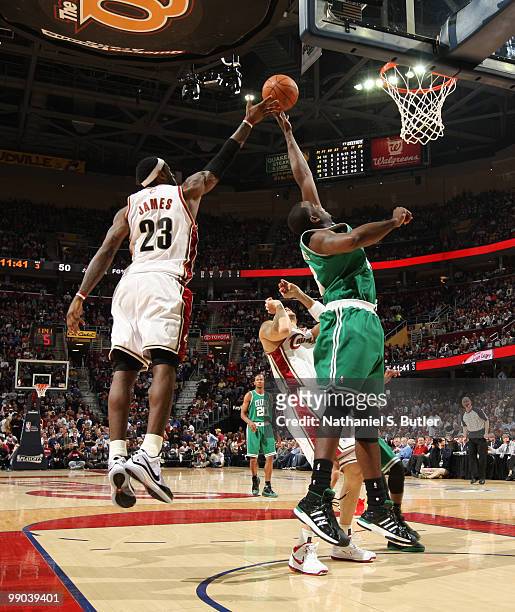 Kendrick Perkins of the Boston Celtics rebounds against LeBron James of the Cleveland Cavaliers in Game Five of the Eastern Conference Semifinals...