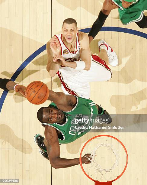 Kendrick Perkins of the Boston Celtics rebounds against Anthony Parker of the Cleveland Cavaliers in Game Five of the Eastern Conference Semifinals...