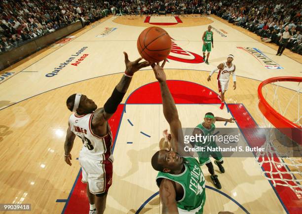 Kendrick Perkins of the Boston Celtics rebounds against LeBron James of the Cleveland Cavaliers in Game Five of the Eastern Conference Semifinals...