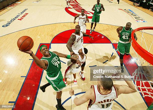 Paul Pierce of the Boston Celtics shoots against Mo Williams and Anthony Parker of the Cleveland Cavaliers in Game Five of the Eastern Conference...