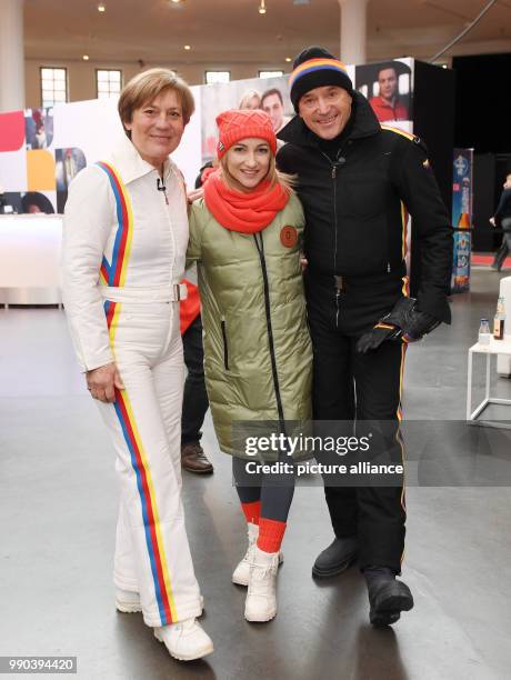 Former skier Rosi Mittermaier , figure skater Aljona Savchenko and the former skier Christian Neureuther stand together during the official dressing...