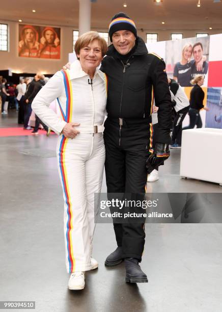 Former skier Rosi Mittermaier and the former skier Christian Neureuther stand together during the official dressing up of the German Olympic Team for...