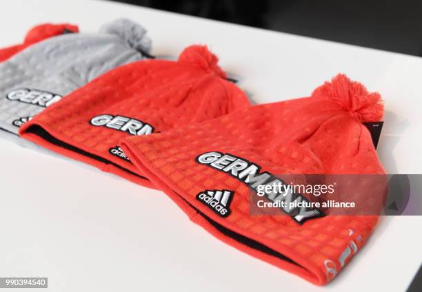 View of the official hats for the Winter Olympic Games Pyeonchang in Munich, Germany, 11 January 2018. Photo: Tobias Hase/dpa