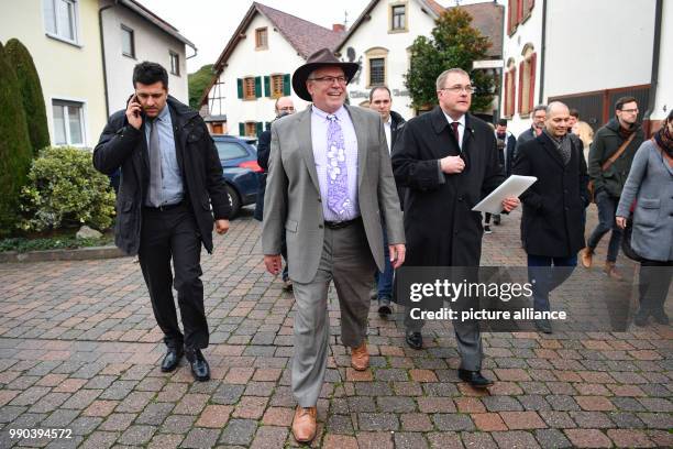 James W. Herman, United States' General Consul in Frankfurt and major of Kallstadt Thomas Jaworek walk through the streets of Kallstadt, Germany, 11...