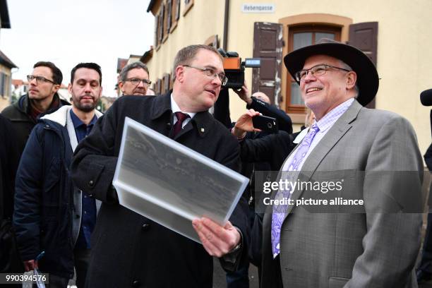 James W. Herman, United States' General Consul in Frankfurt and major of Kallstadt Thomas Jaworek stand at the Hebengasse of Kallstadt, Germany, 11...