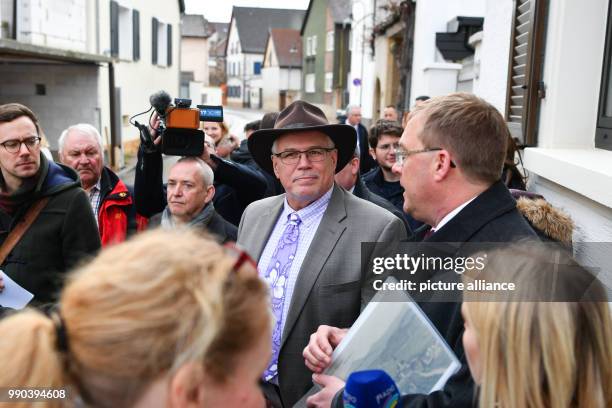 James W. Herman, United States' General Consul in Frankfurt and major of Kallstadt Thomas Jaworek stand on the side of the street in of Kallstadt,...