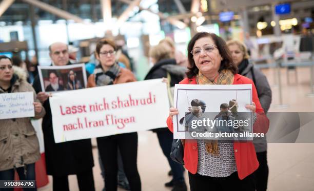 Political activist Mina Ahadi talks during the protests at Terminal 1 of the airport in Hamburg, 11 January 2018. The protesters want to impede the...
