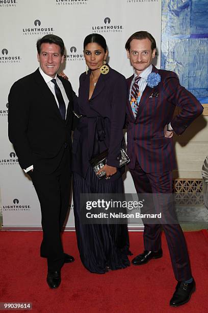 Michael Bruno, designer Rachel Roy and editor Hamish Bowles attend the kick-off dinner for Lighthouse International's POSH Fashion sale at the Oak...