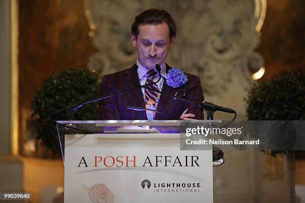 European editor-at-large Vogue Hamish Bowles speaks on stage at the kick-off dinner for Lighthouse International's POSH Fashion sale at the Oak Room...