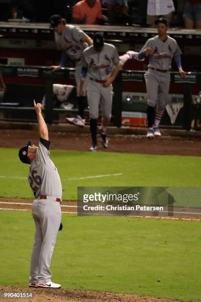 Relief pitcher Bud Norris of the St. Louis Cardinals celebrates after defeating the Arizona Diamondbacks 6-3 in the MLB game at Chase Field on July...