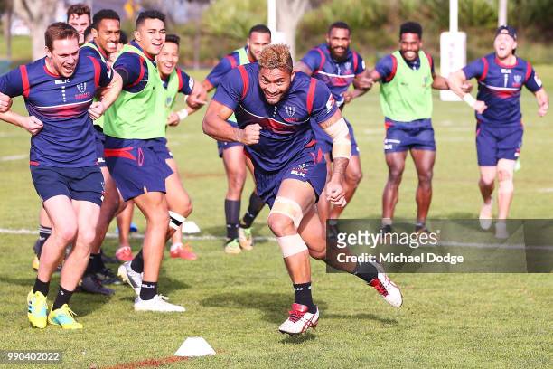 Amanaki Mafi participates in a drill during a Melbourne Rebels Super Rugby training session at Gosch's Paddock on July 3, 2018 in Melbourne,...