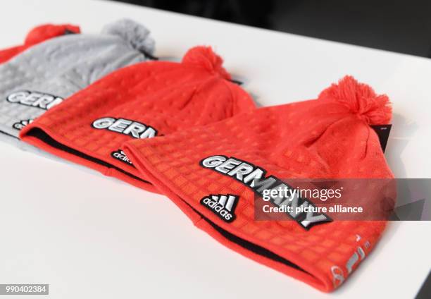 View of the official hats for the Winter Olympic Games Pyeonchang in Munich, Germany, 11 January 2018. Photo: Tobias Hase/dpa