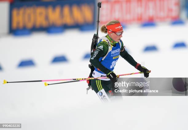 Biathlete Franziska Hildebrand from Germany skis during the race at Chiemgau Arena in Ruhpolding, Germany, 11 January 2018. Photo: Matthias Balk/dpa