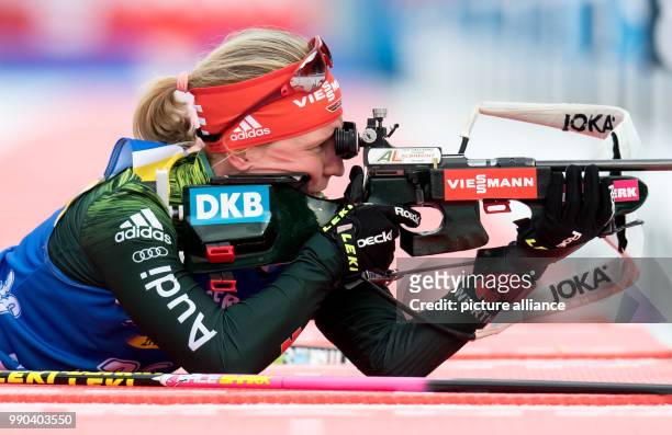 Biathlete Franziska Hildebrand from Germany takes aim at the shooting range at Chiemgau Arena in Ruhpolding, Germany, 11 January 2018. Photo: Sven...
