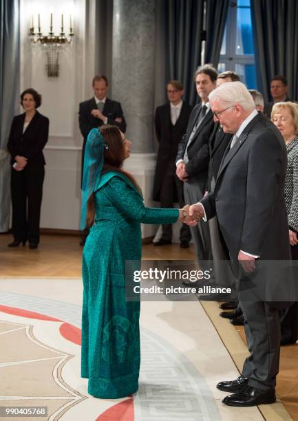 German President Frank-Walter Steinmeier welcomes Maldivian diplomat Jameela Ali Khalid to his annual New Year's reception for the diplomatic corps...