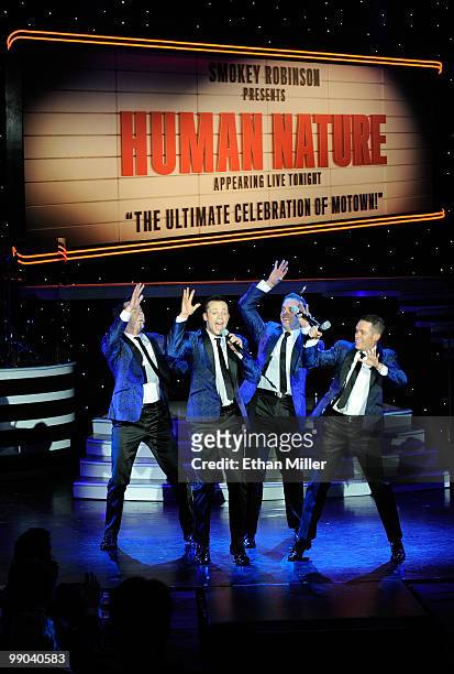 Australian vocal group Human Nature Phil Burton, Andrew Tierney, Toby Allen and Michael Tierney perform after announcing a two-year extension of...