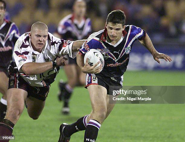 Mark O''Meley of the Eagles chases Ivan Cleary of the Warriors during the round 15 NRL match between the New Zealand Warriors and the Northern Eagles...