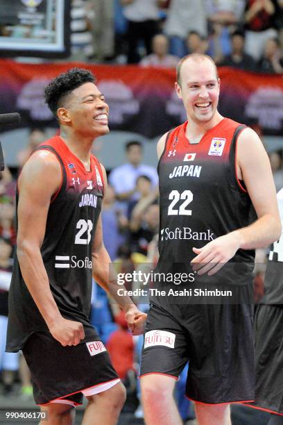 Rui Hachimura and Nick Fazekas of Japan celebrate their victory in the FIBA World Cup Asian Qualifier Group B match between Japan and Australia at...