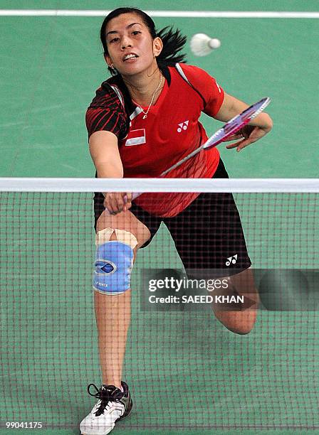 Indonesia's Adriyanti Firdasari plays a shot against Malaysia's Mew Choo Wong during the Uber Cup badminton championships in Kuala Lumpur on May...