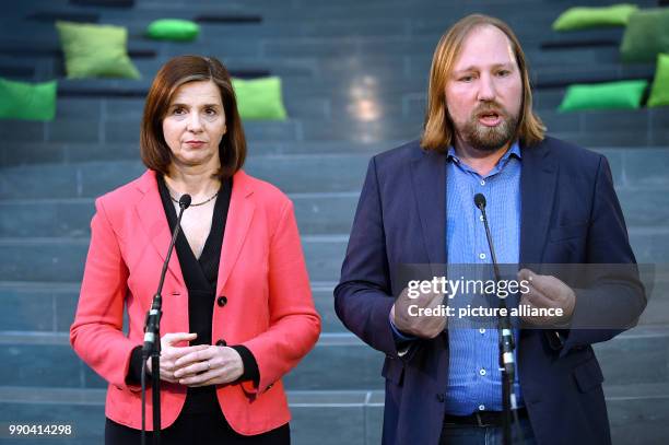 Katrin Goering-Eckardt, re-elected chairman of Alliance 90/The Greens, and fellow politician Anton Hofreiter speak to the media after holding a...