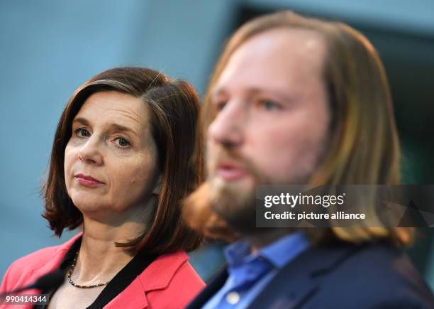 Katrin Goering-Eckardt, re-elected chairman of Alliance 90/The Greens, and fellow politician Anton Hofreiter speak to the media after holding a...