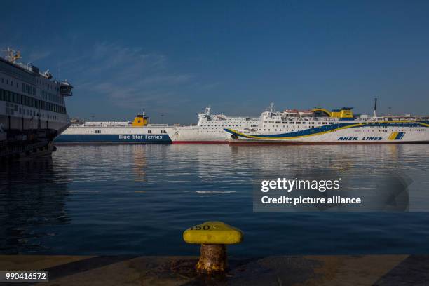 Ferries can be seen at the port of Piraeus, in Athens, Greece, 12 January 2018. Workers protest against the planned reductions of their freedom of...