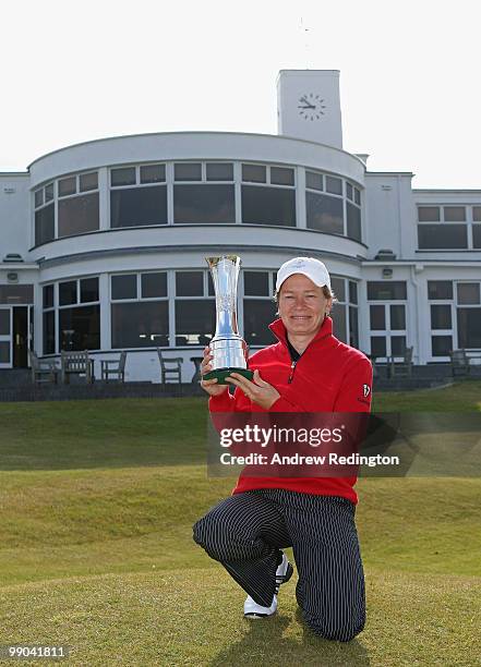 Catriona Matthew of Scotland, the defending champion, poses with the trophy during the 2010 Ricoh Women's British Open Media Day at Royal Birkdale on...