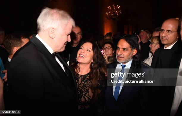 Premier of Bavaria Horst Seehofer speaking with actress Christine Neubauer and Jose Campos at a New Year reception at the Residenz in Munich,...