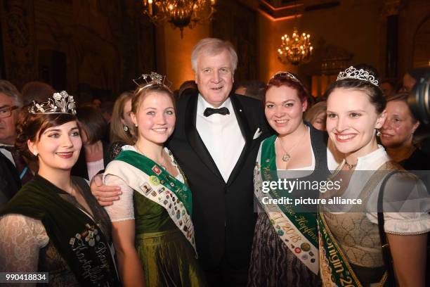 Premier of Bavaria Horst Seehofer standing with Hopfenkoeniginnen at a New Year reception at the Residenz in Munich, Germany, 12 January 2018. Photo:...