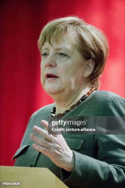 German Chancellor Angela Merkel delivers a speech during the New Year's Reception of the state counsil of the district Vorpommern-Ruegen in...