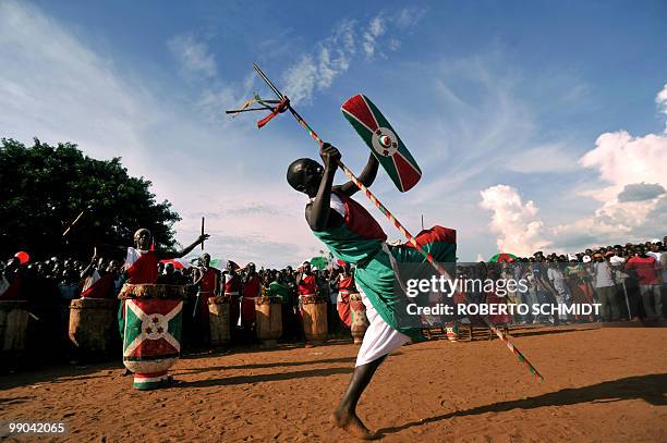 Traditional Burundian drummer welcomes a leader of the ruling party during a political rally at a sports field in Bujumbura on May 11, 2010. Some 3.5...