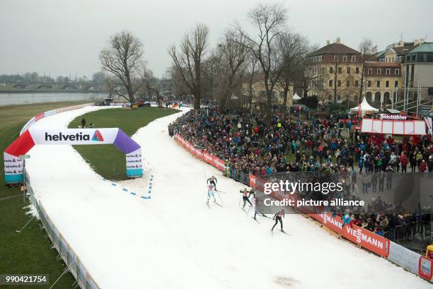 Athletes compete in the women's freestyle quarter finals at the Cross Country Skiing World Cup in Dresden, Germany, 13 January 2018. Photo: Sebastian...