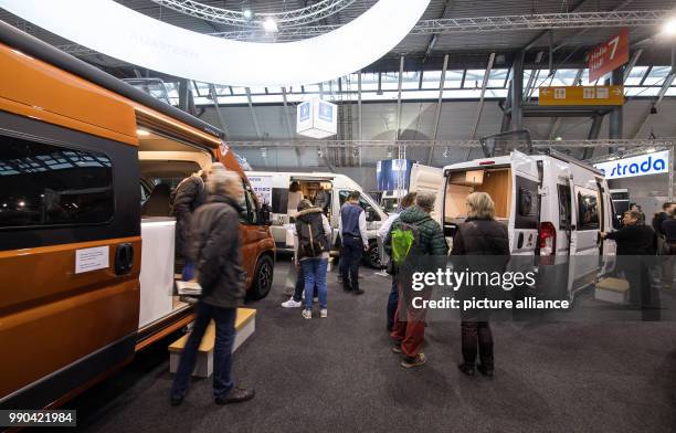 Visitors queue up in front of the Westfalia stall at the Caravan, Motor and Tourism trade fair in Stuttgart, Germany, 13 January 2018. About 2000...