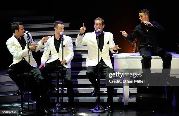 Australian vocal group Human Nature Phil Burton, Andrew Tierney, Toby Allen and Michael Tierney perform after announcing a two-year extension of...