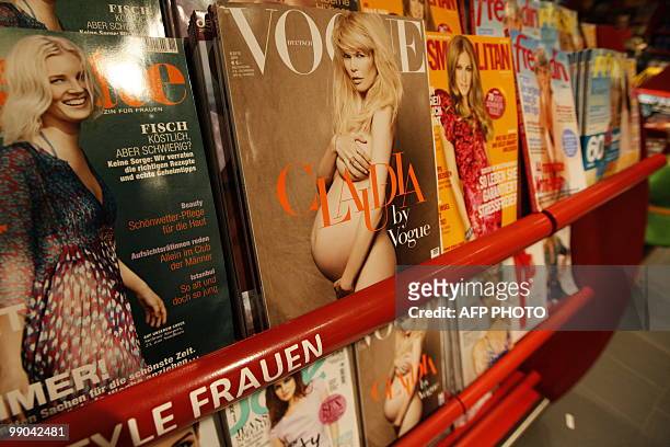 Magazines including the June 2010 edition of the German Vogue magazine with heavily pregnant German supermodel Claudia Schiffer naked on the cover,...