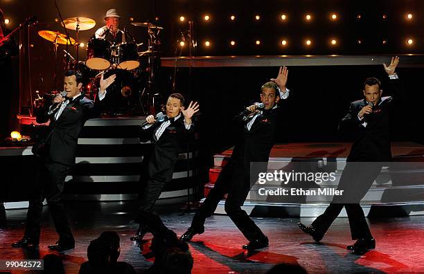 Australian vocal group Human Nature Phil Burton, Michael Tierney, Toby Allen and Andrew Tierney perform after announcing a two-year extension of...