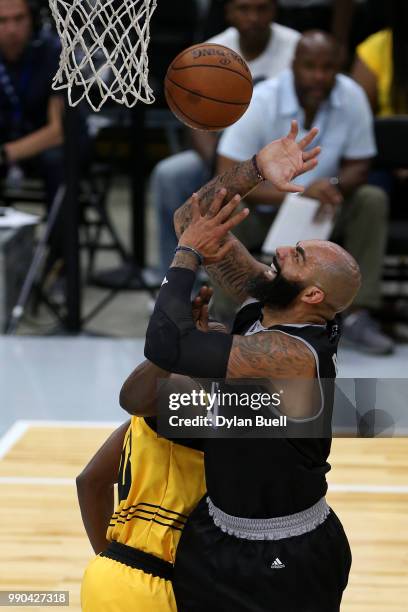 Carlos Boozer of Ghost Ballers is fouled by the Killer 3s during week two of the BIG3 three on three basketball league at United Center on June 29,...