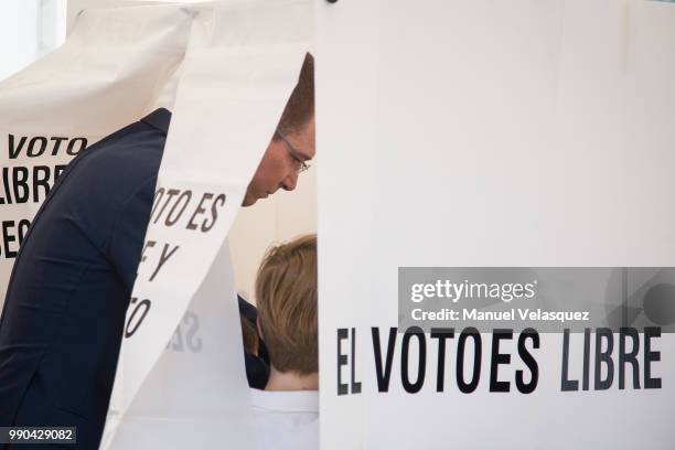 Ricardo Anaya, Presidential Candidate for the coalition 'Por Mexico al Frente', votes at his polling station as part of the Mexico 2018 Presidential...