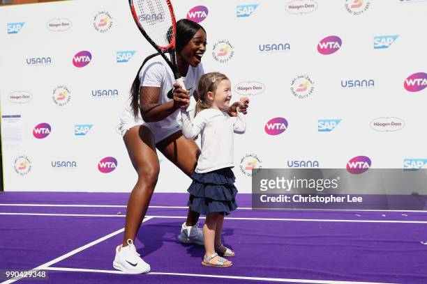 Sloane Stephens, US Open Champion & current world no.4, challenges tennis fan Daisy-May Graves, aged 4, at the Womens Tennis Associations Tennis on...