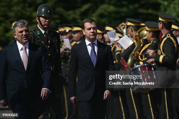 Russian President Dmitry Medvedev and Turkish President Abdullah Gul review a guard of honour at the presidential palace on May 12, 2010 in Ankara,...