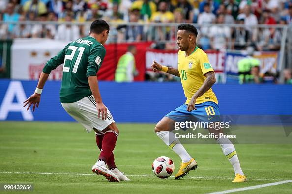 Sofyan Amrabat of Morocco and Neymar da Silva Santos of Brazil