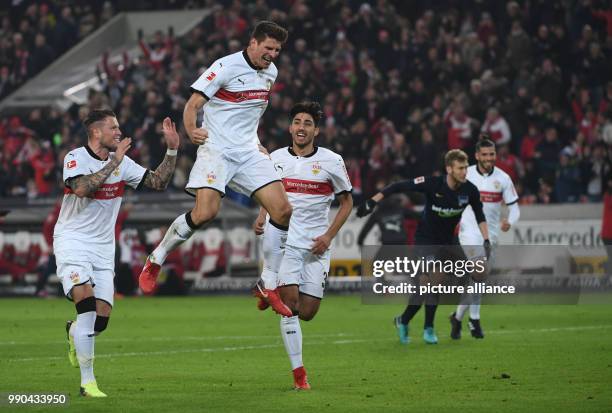 Stuttgart's Mario Gomez , Daniel Ginczek and Berkay Ozcan celebrate after a goal during the German Bundesliga football match between VfB Stuttgart...