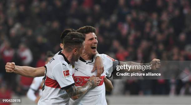 Stuttgart's Mario Gomez , Daniel Ginczek and Berkay Ozcan celebrate after a goal during the German Bundesliga football match between VfB Stuttgart...