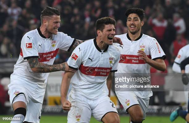 Stuttgart's Mario Gomez , Daniel Ginczek and Berkay Ozcan celebrate after a goal during the German Bundesliga football match between VfB Stuttgart...