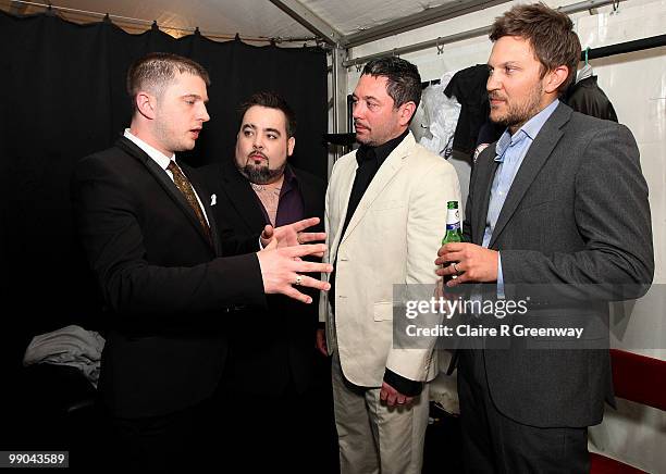 Plan B talks to Fun Lovin' Criminals members Frank Benbini, Huey Morgan and Brian Leiser in their dressing room backstage during a recording of the...