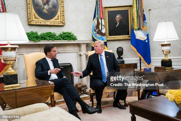 President Donald J. Trump speaks with Mark Rutte, Prime Minister of the Netherlands, during a meeting in the Oval Office of the White House on...