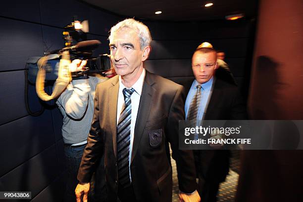 France national football team's coach Raymond Domenech leaves a press conference? on May 11, 2010 in Paris, after announcing the team members...