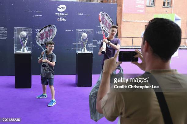 Fans view the displays during the WTA Tennis On The Thames in Bernie Spain Gardens on June 28, 2018 in London, England.