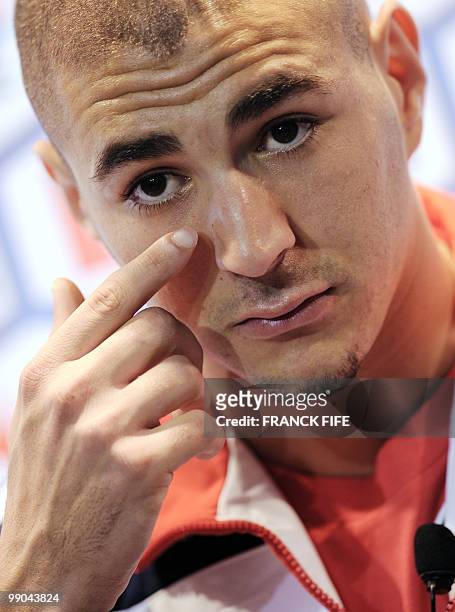 Picture taken on October 8, 2009 shows French forward Karim Benzema during a press conference at the stadium of Perros-Guirec, western France....