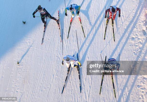 Cross country female athletes on the route along the river Elbe during the women's freestyle team sprint 6 x 1.2 km event at the Cross Country Skiing...